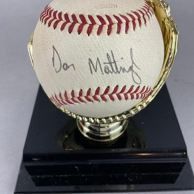 B794 Autographed Baseball By Don Mattingly "Donnie Baseball" On Trophy Glove Base