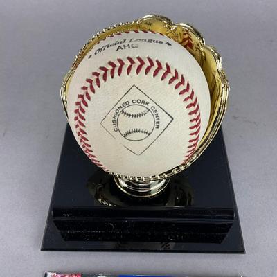 B794 Autographed Baseball By Don Mattingly "Donnie Baseball" On Trophy Glove Base