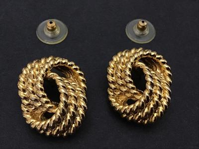 Gold Tone Knot Earrings.