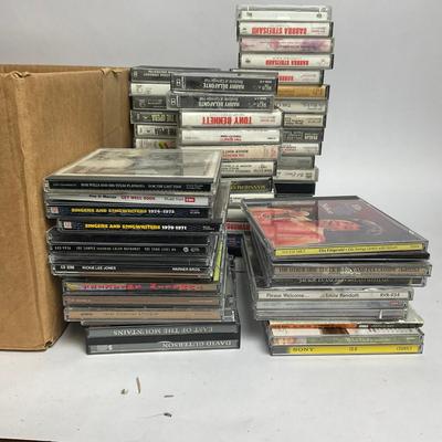 G962 Assortment Of CD's With Cassette Tapes