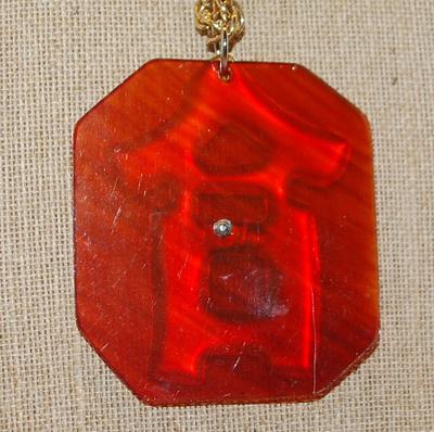 Gold Colored Extra Large CHINESE LETTER PENDANT NECKLACE (3" x 2¾") on Acrylic Base and WRAP-AROUND Gold Tone CHAIN 36" L