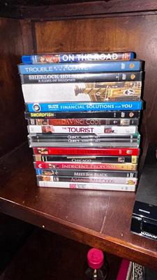 MAGNAVOX DVD PLAYER WITH AN ASSORTMENT OF MOVIES