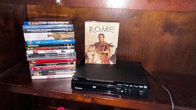 MAGNAVOX DVD PLAYER WITH AN ASSORTMENT OF MOVIES