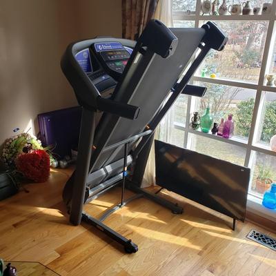 LOT 29: Horizon Fitness Treadmill-Feather Light Folding