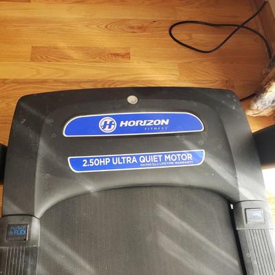 LOT 29: Horizon Fitness Treadmill-Feather Light Folding