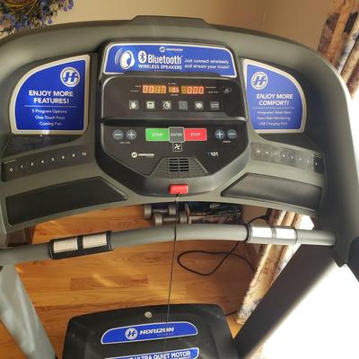 LOT 29: Horizon Fitness Treadmill-Feather Light Folding