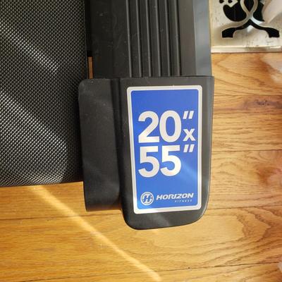LOT 29: Horizon Fitness Treadmill-Feather Light Folding
