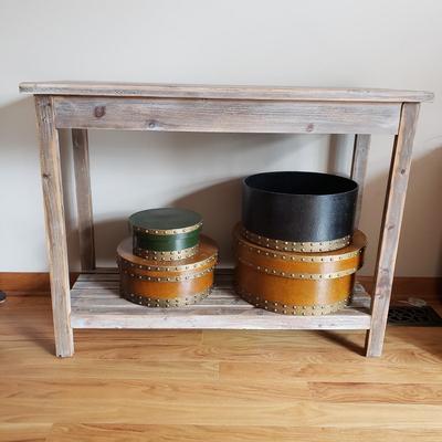 LOT 36: Rustic Wood Console Table with Stack of Decorative Round Boxes