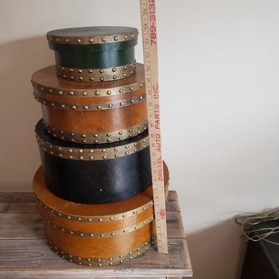 LOT 36: Rustic Wood Console Table with Stack of Decorative Round Boxes