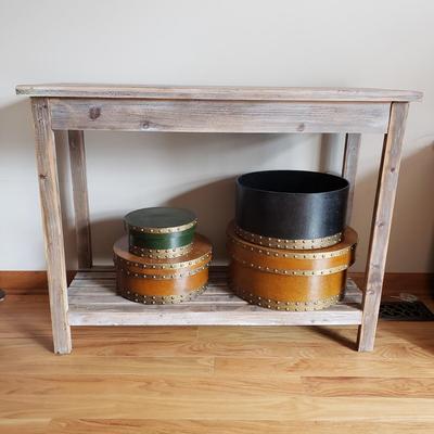 LOT 36: Rustic Wood Console Table with Stack of Decorative Round Boxes