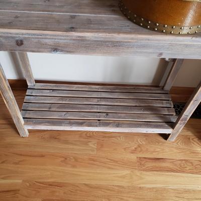 LOT 36: Rustic Wood Console Table with Stack of Decorative Round Boxes