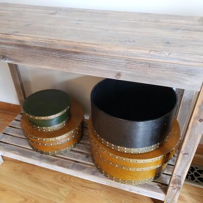 LOT 36: Rustic Wood Console Table with Stack of Decorative Round Boxes