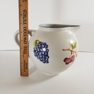 LOT 96: Kitchen Assortment-Pottery Wall Clock, Fiesta Mugs, New Cutting Board & More