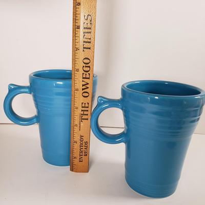 LOT 96: Kitchen Assortment-Pottery Wall Clock, Fiesta Mugs, New Cutting Board & More