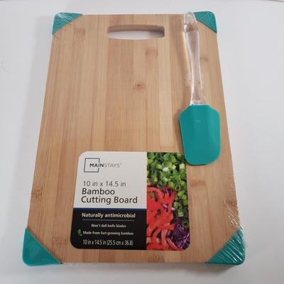 LOT 96: Kitchen Assortment-Pottery Wall Clock, Fiesta Mugs, New Cutting Board & More