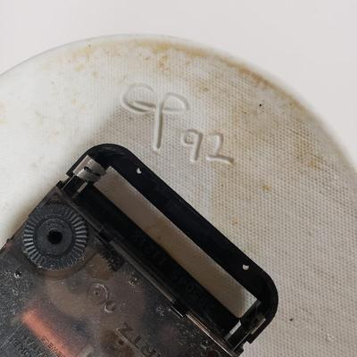 LOT 96: Kitchen Assortment-Pottery Wall Clock, Fiesta Mugs, New Cutting Board & More