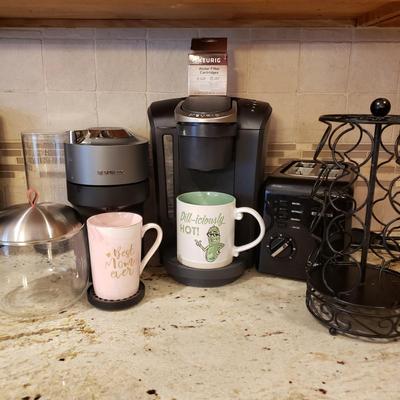 LOT 179: Nespresso Vertuo Pop Coffee Machine with Capsule Dispenser, Keurig Coffee Maker with Pod Storage Rack & Accessories,...