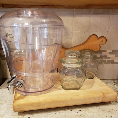 LOT 184: Wooden Cutting Boards, Large Plastic Beverage Dispenser & Glass Canisters