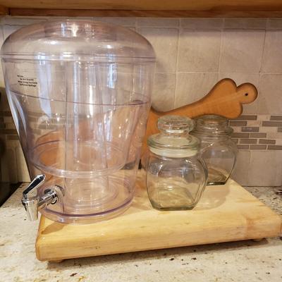 LOT 184: Wooden Cutting Boards, Large Plastic Beverage Dispenser & Glass Canisters