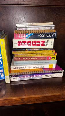 AN ASSORTMENT OF BOOKS AND CDS