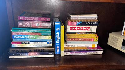 AN ASSORTMENT OF BOOKS AND CDS