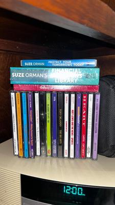 AN ASSORTMENT OF BOOKS AND CDS