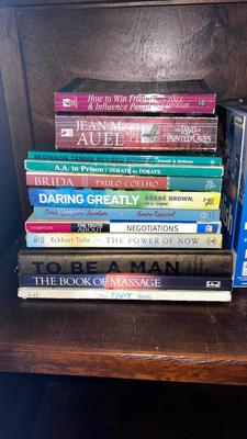 AN ASSORTMENT OF BOOKS AND CDS