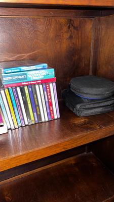AN ASSORTMENT OF BOOKS AND CDS