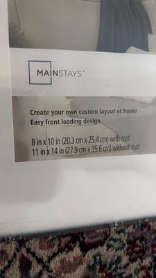 PAINTING BY AN UNKNOWN ARTIST AND TWO PHOTO FRAMES