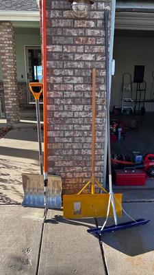 SNOW SHOVELS AND A TREE SAW