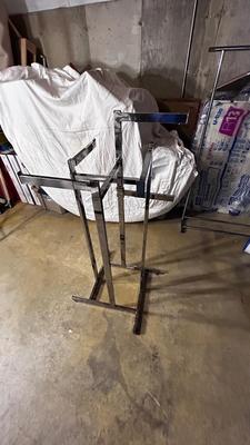 ADJUSTABLE CLOTHING RACK AND A FOLDING GARMENT RACK