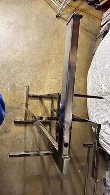 ADJUSTABLE CLOTHING RACK AND A FOLDING GARMENT RACK