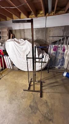 ADJUSTABLE CLOTHING RACK AND A FOLDING GARMENT RACK