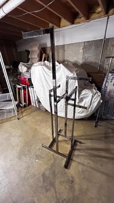 ADJUSTABLE CLOTHING RACK AND A FOLDING GARMENT RACK