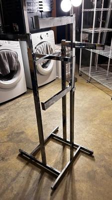 ADJUSTABLE CLOTHING RACK AND A FOLDING GARMENT RACK