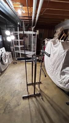 ADJUSTABLE CLOTHING RACK AND A FOLDING GARMENT RACK