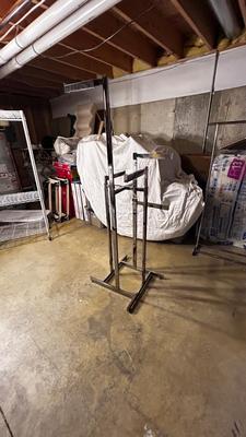 ADJUSTABLE CLOTHING RACK AND A FOLDING GARMENT RACK