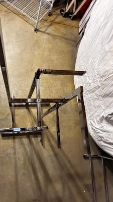 ADJUSTABLE CLOTHING RACK AND A FOLDING GARMENT RACK