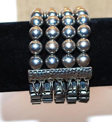 Solid Silver Colored Elastic BRACELET (2¼" Opening) with 4 Rows of Globes and 5 Rows of Loops with 2 Vertical Bars