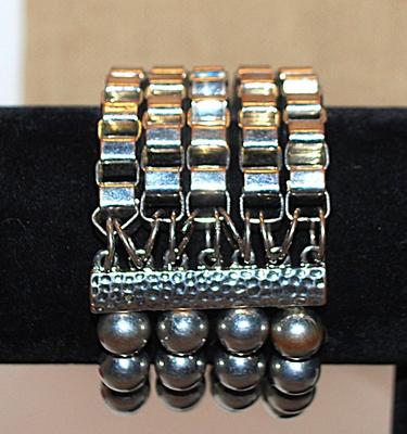 Solid Silver Colored Elastic BRACELET (2¼" Opening) with 4 Rows of Globes and 5 Rows of Loops with 2 Vertical Bars