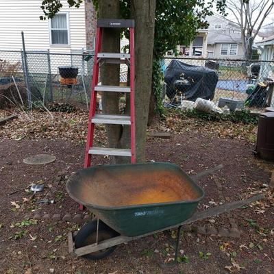 LOT 270: True Temper Steel Wheelbarrow & Husky 6 Ft Ladder