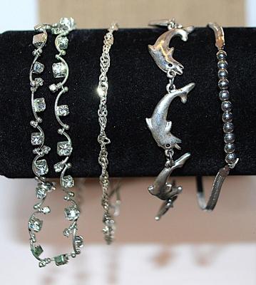 Collection of 4 Silver-Colored Style BRACELETS Including 1 with Dolphins