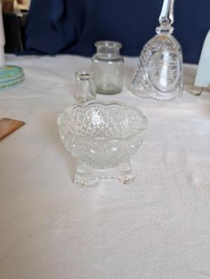 Miscellaneous group...statue glass bell, Precious Moments, pin, safety pin, miniature bottle of perfume, 2 small jars, Wedgwood,glass bowl