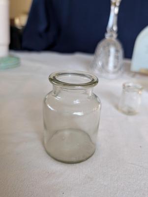 Miscellaneous group...statue glass bell, Precious Moments, pin, safety pin, miniature bottle of perfume, 2 small jars, Wedgwood,glass bowl
