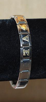 Silver Tone Elastic "LOVE' BRACELET (2¼" Opening) - Marked "ADD-A-CHARM ©" with Gold Colored Letters...