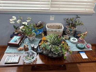 Sale Photo Thumbnail #30: Decorative items including Clay Works by Blue Sky, ashtray, paper weights and coasters