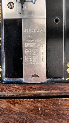 NICE EARLY 1900’s MINNESOTA TREADLE SEWING MACHINE WITH ACCESSORIES, NOTIONS AND ORIGINAL PAPERWORK