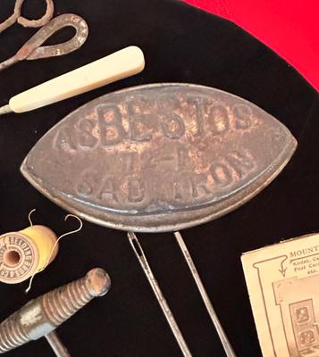 ANTIQUE SAD IRONS, THREAD SPOOLS, GUNNY SACK NEEDLES AND MORE