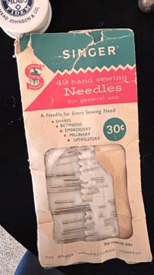 ANTIQUE SAD IRONS, THREAD SPOOLS, GUNNY SACK NEEDLES AND MORE