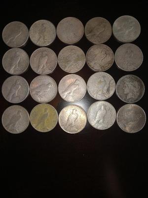 Tube of 20 various dates peace dollars